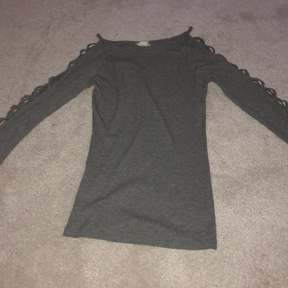 a grey, long sleeve fitted shirt